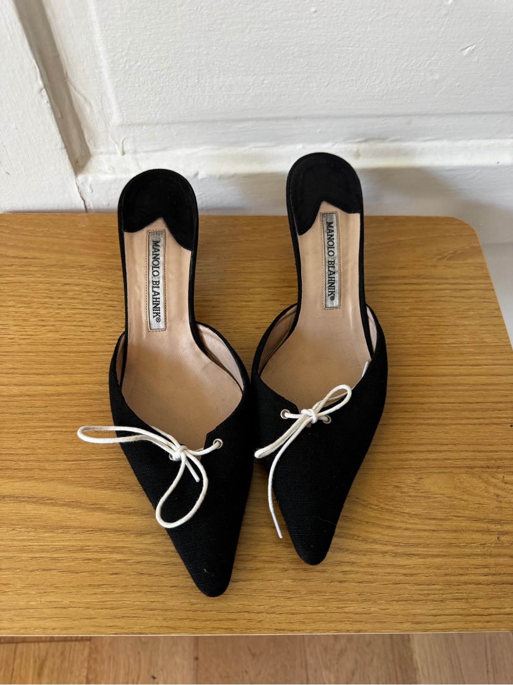 Manolo Blahnik Black Pointed Toe Mules with White Bow Accent